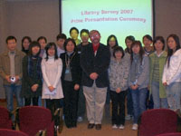 The lucky winners received their prizes from the University Librarian, Dr. Colin Storey
